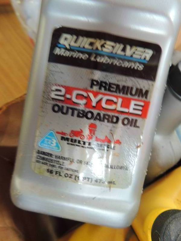 lot 943 image: 7 bottles of 2 cycle outdoor motor ...