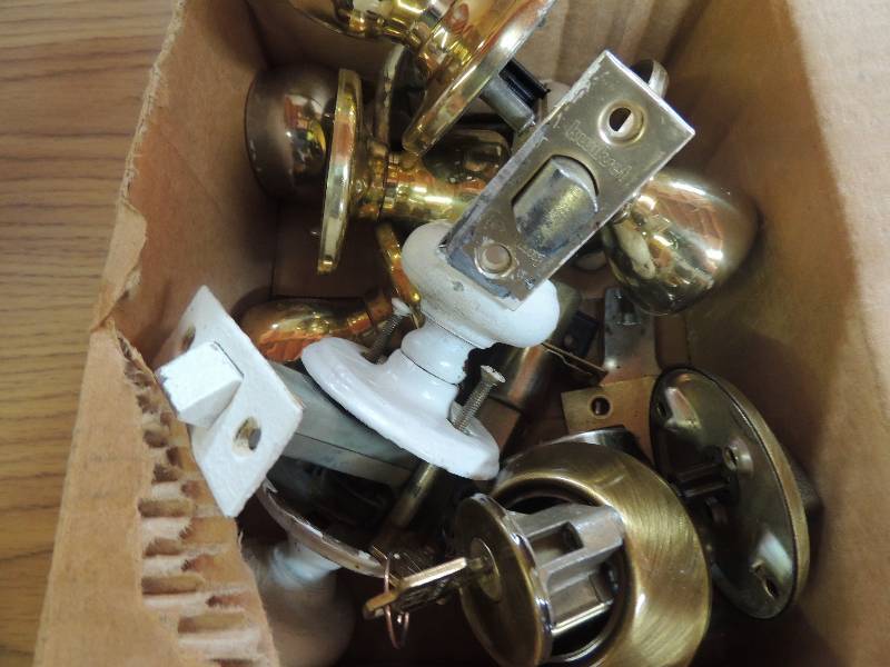 lot 944 image: assorted door knobs and locks...