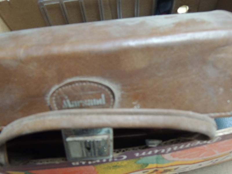 lot 860 image: lens and camera cases...