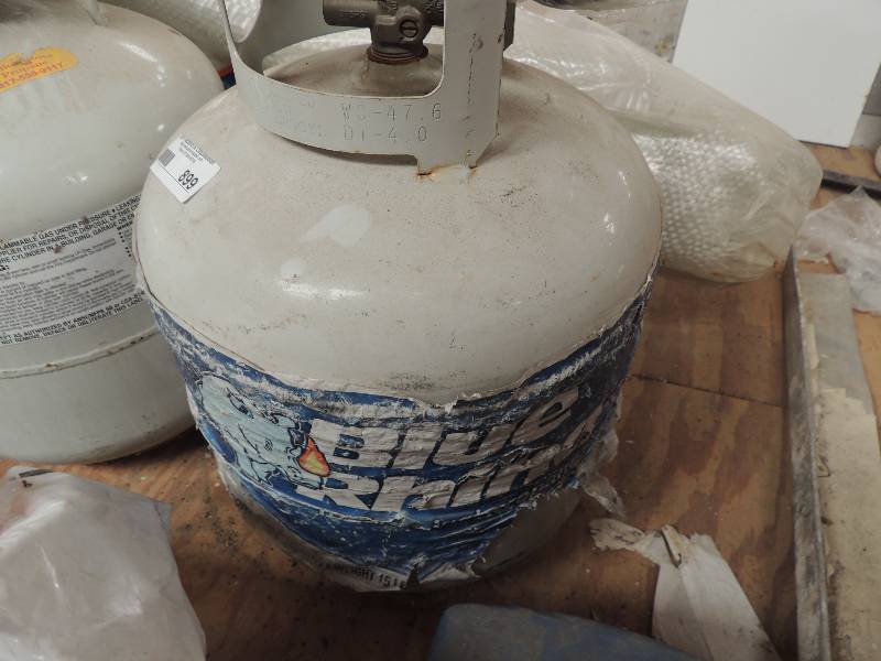 lot 899 image: Propane tank 15 gal with hoses...