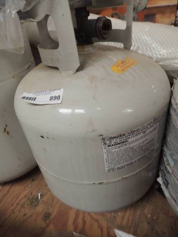 lot 898 image: Propane tank 15 gal with hoses...