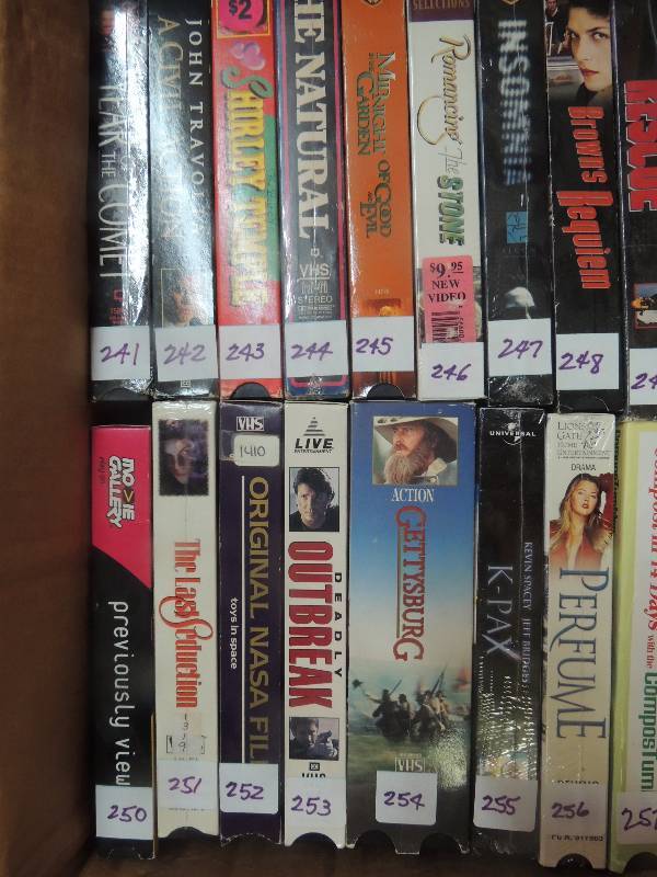lot 583 image: Box of VHS tapes...
