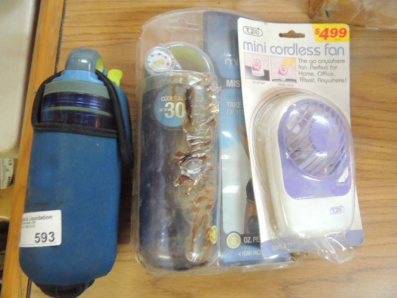lot 593 image: Misty mat and mini cordless fan...