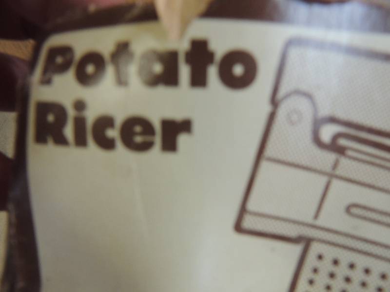 lot 955 image: Potatoe ricer, vintage...