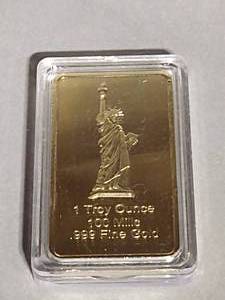 lot 8 image: One Bar (One Troy Ounce 100 Mille .999 Fine Gold Bar)