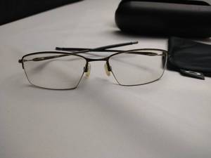 lot 31 image: Oakley Lizard Prescription Glasses