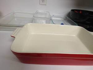lot 45 image: 3 clear glass Pyrex baking dishes, 3L, 2L, and 2.2qt - 2 L, doubled handled red Martha Stewart baking dish