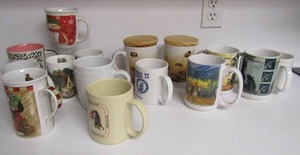 lot 56 image: Large lot of coffee cups, Christmas cracker barrel and more