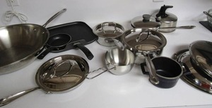 lot 65 image: lot of Cuisinart pots and pans used, all have lids plus extra, skillets and more