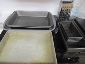 lot 68 image: Aluminum baking dishes, cheese shredder, mini bread pas qty 5