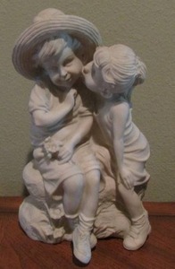 lot 93 image: 13 tall little boy and girl dcor