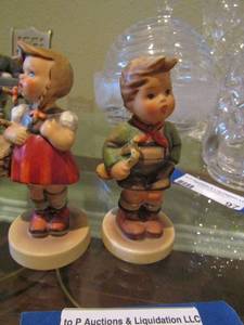 lot 98 image: Mj Hummel girl with basket, Goebel MJ Hummel trumpet boy