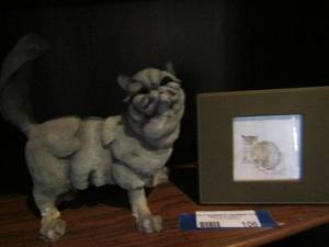 lot 106 image: A breed apart posh ceramic cat ( tail is chipped) Framed drawing of a cat By M. Bend