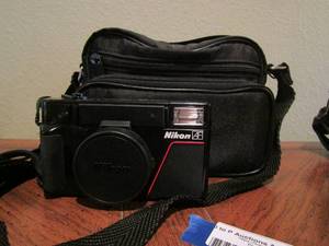 lot 112 image: Nikon L35 af camera with carrying bag