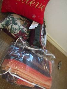 lot 150 image: Dcor pillows, Christmas pillow and 1 quilt