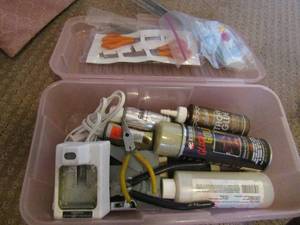 lot 164 image: Pink caddy with tools and paints , new scissors, plyers, paints, and more