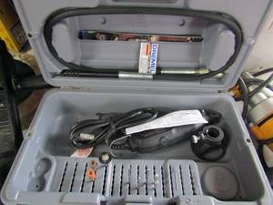 lot 215 image: Dremel tool set in case, missing a few pieces