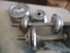 lot 225 image: Set of dumbbells with various size bar bells
