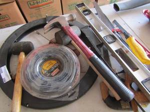 lot 244 image: tool lot includes hammers, trimming line, saws and more