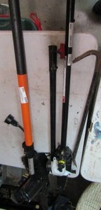 lot 192 image: Remington pole saw electric, various parts and attachments to a craftsman pole saw