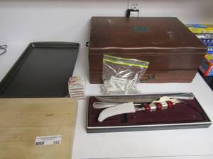 lot 182 image: flat baking pan, cutting board, empty silverware box, and 3 pieces of silver ware
