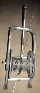lot 199 image: Ames water hose roller with scrub broom for washing your vehicle