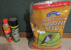 lot 189 image: Black bird seed New bag, used can of off and wasp spray