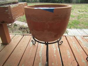 lot 293 image: Orange plant pot on stand, 1216 diameter