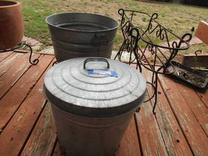 lot 294 image: grey bucket bottom is out used for dcor, plant stand qty2, metal out door bucket can with lid