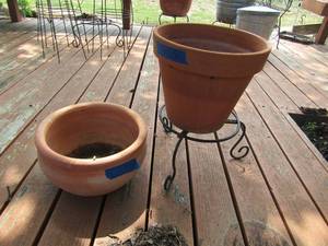 lot 308 image: 2 metal plant stands and small pottery pot
