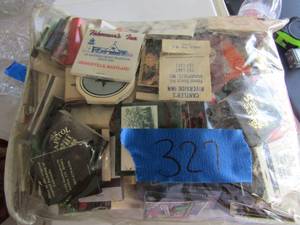 lot 327 image: bag full of new match books from Dallas cowboys, playboy, bare bones, puppysits and more