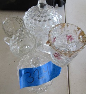 lot 324 image: set of clear glass sugar and creamer, covered candy bowl, covered sugar dish, crystal doubled handled cup