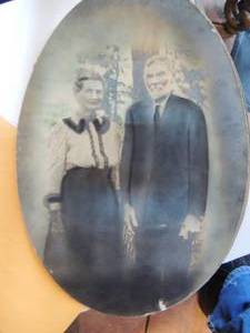 lot 402 image: Antique oval photo of couple 20x14