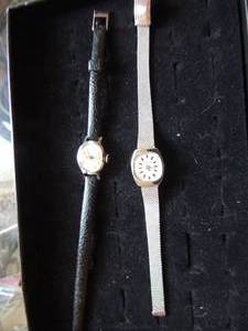 lot 428 image: Ladies Timex black leather band & Geneva Watch