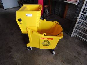 lot 337 image: MOP BUCKET ON ROLLERS