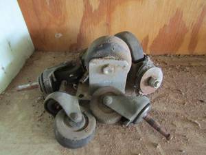 lot 644 image: Vintage table or chair wheels