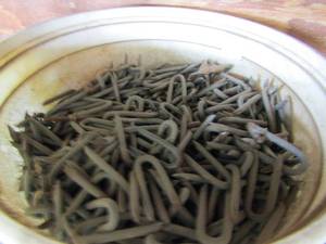 lot 692 image: bucket of galvanized staples