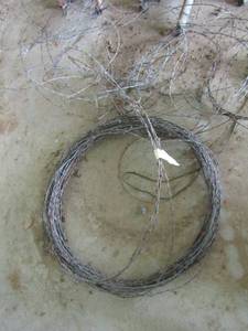lot 737 image: roll of metal barbed wire