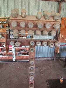 lot 781 image: NUTS, BOLTS, NAILS IN TURN TABLE ON Steel pipe STAND , heavy duty
