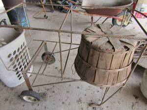 lot 791 image: Metal rolling TRASH CAN cart with a wicker basket