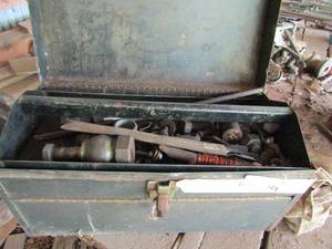 lot 821 image: Metal tool box with various scrapers, wire, bolts and more