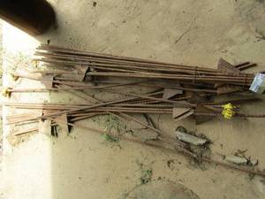 lot 835 image: Rod iron fence post 
