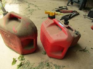 lot 838 image: 3 gas cans 1 is no spill newer one