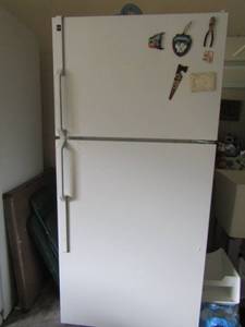 lot 410 image: Hot point refrigerator plugged up and working now. SOLD AS IT clean inside and out used as garage fridge