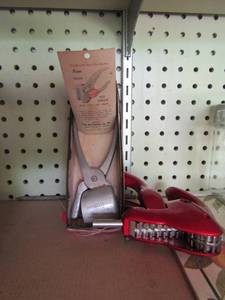 lot 418 image: Wine cork opener and a vintage pecan huller