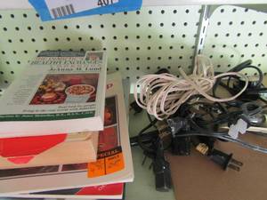 lot 405 image: various light lamp plugs, and a assortment of cook books