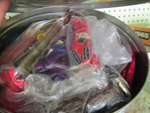 lot 415 image: Tin can full of sewing needles, string and more