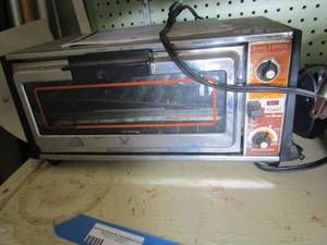 lot 429 image: GE bakebroil oven with paperwork