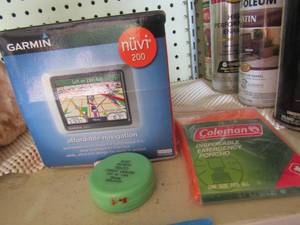 lot 467 image: Garmin gps in original box opened, Coleman poncho