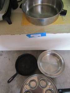 lot 469 image: 8 in cast iron skillet, aluminum pan, aluminum sauce pans